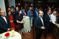 Invitees intently listening to Manav Thadani's speech